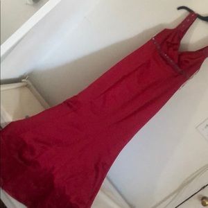 A beautiful red dress with embroidery.